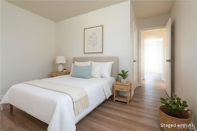 2938 Oregon Ave, Granite City, IL 62040 - bedroom with light wood-style floors and baseboards