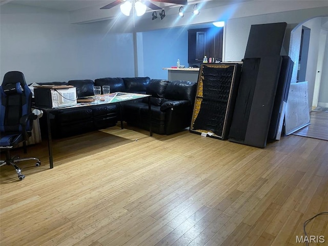 709 E 10th St, Rolla, MO 65401 - office featuring light wood finished floors, arched walkways, and a ceiling fan