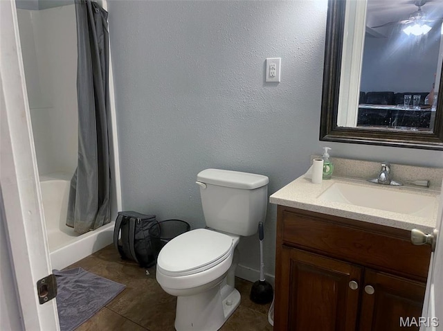 709 E 10th St, Rolla, MO 65401 - bathroom with vanity, toilet, a shower with shower curtain, and tile patterned floors