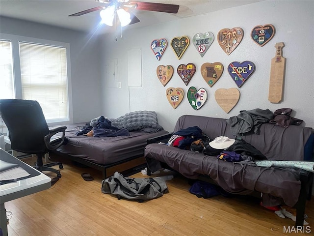 709 E 10th St, Rolla, MO 65401 - bedroom featuring wood finished floors and ceiling fan