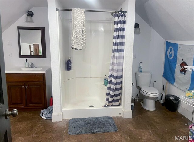 709 E 10th St, Rolla, MO 65401 - full bathroom with vaulted ceiling, a stall shower, toilet, and vanity