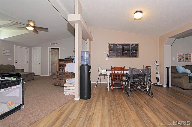 301 Kimberly Dr, Scott City, MO 63780 - dining area featuring lofted ceiling, light wood-style flooring, ceiling fan, and arched walkways
