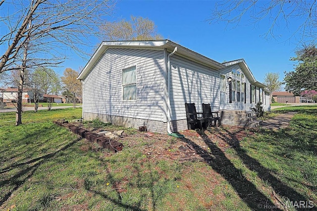 301 Kimberly Dr, Scott City, MO 63780 - view of property exterior with a lawn