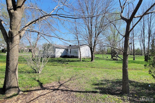301 Kimberly Dr, Scott City, MO 63780 - view of green lawn with a playground