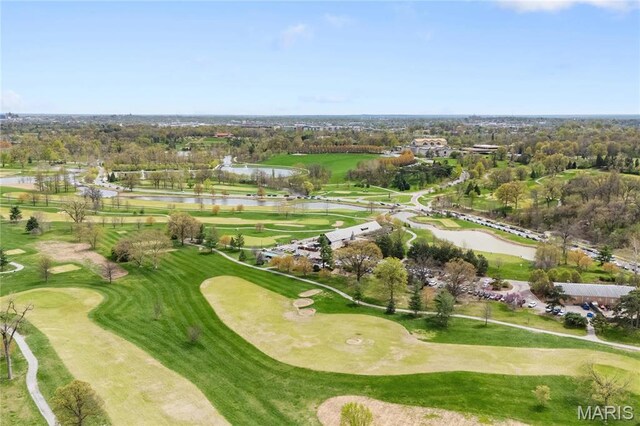 6026 Waterman Blvd Unit 1W, Saint Louis, MO 63112 - aerial view of property and surrounding area with a nearby body of water, a local golf course, and a tree filled landscape