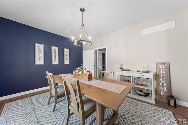 11 Country Crossing Estates Dr, Saint Peters, MO 63376 - dining area with a chandelier and wood finished floors