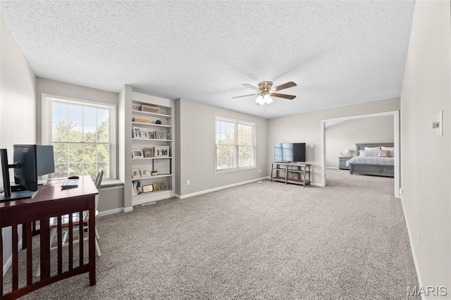 11 Country Crossing Estates Dr, Saint Peters, MO 63376 - carpeted bedroom featuring a desk, a textured ceiling, and ceiling fan
