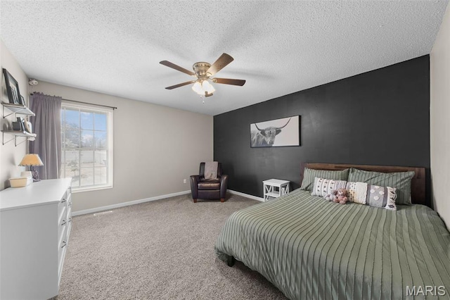 11 Country Crossing Estates Dr, Saint Peters, MO 63376 - bedroom with carpet, ceiling fan, an accent wall, and a textured ceiling