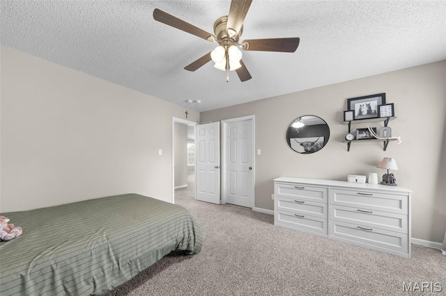 11 Country Crossing Estates Dr, Saint Peters, MO 63376 - bedroom featuring light carpet, a textured ceiling, and ceiling fan