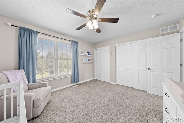11 Country Crossing Estates Dr, Saint Peters, MO 63376 - living area featuring ceiling fan, light colored carpet, and a textured ceiling