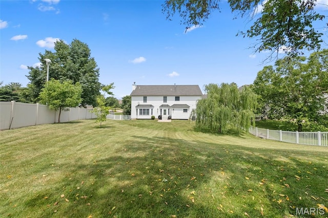 11 Country Crossing Estates Dr, Saint Peters, MO 63376 - back of property featuring a fenced backyard and stucco siding
