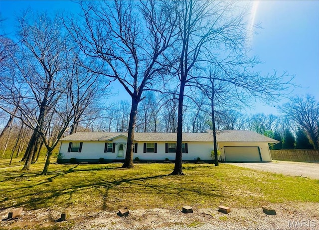 view of front of house with driveway and a garage