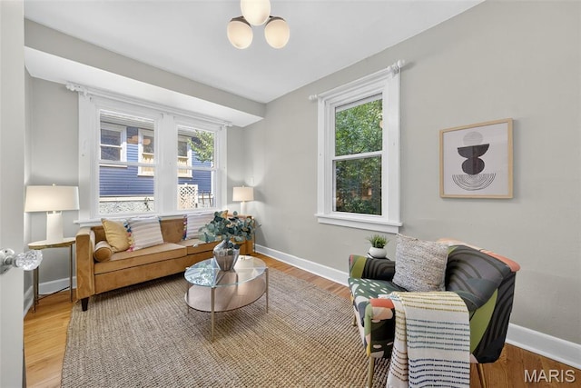 837 Tuxedo Blvd, Saint Louis, MO 63119 - living area featuring baseboards and wood finished floors