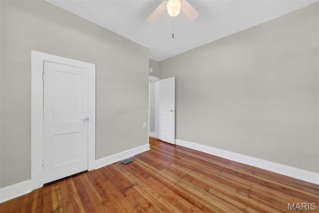 837 Tuxedo Blvd, Saint Louis, MO 63119 - spare room with a ceiling fan and light wood-style floors