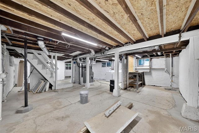 837 Tuxedo Blvd, Saint Louis, MO 63119 - basement featuring stairs and heating unit