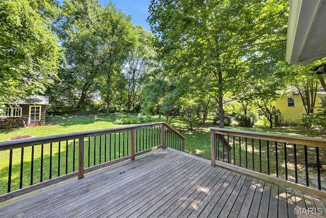 837 Tuxedo Blvd, Saint Louis, MO 63119 - wooden terrace featuring an outdoor structure and a lawn