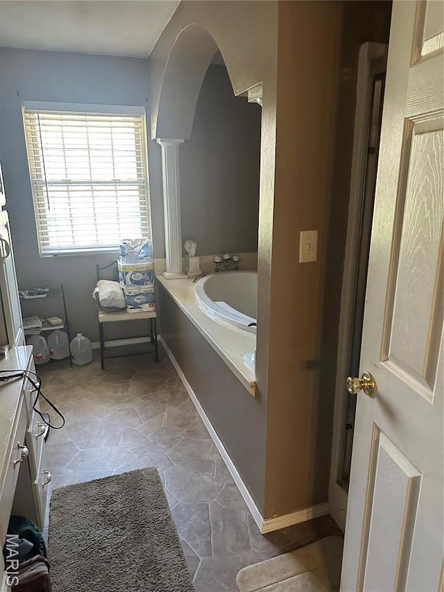 949 Ripley 21n-4, Doniphan, MO 63935 - bathroom featuring a garden tub and baseboards