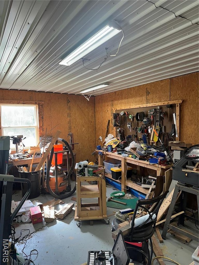 949 Ripley 21n-4, Doniphan, MO 63935 - garage with wood walls and a workshop area