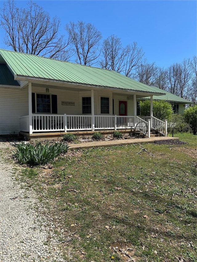 949 Ripley 21n-4, Doniphan, MO 63935 - view of front of home with covered porch and metal roof