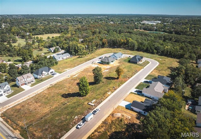 235 Sunny Dr, Rolla, MO 65401 - view of property location with a heavily wooded area and nearby suburban area