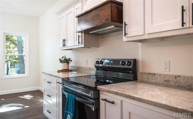 235 Sunny Dr, Rolla, MO 65401 - kitchen featuring black / electric stove, custom range hood, white cabinetry, baseboards, and dark wood-type flooring