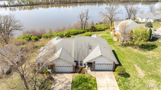 view from above of property with a large body of water