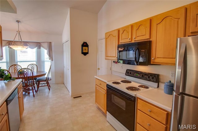 kitchen with stainless steel appliances, light countertops, lofted ceiling, light flooring, and pendant lighting