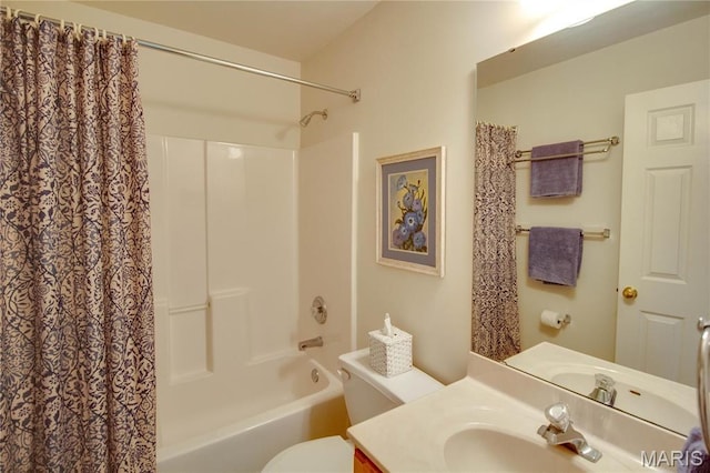 full bath with toilet, shower / bath combo with shower curtain, and vanity