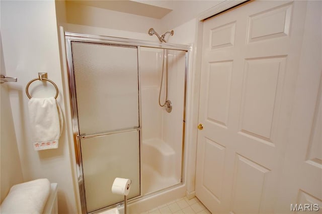bathroom featuring a shower stall