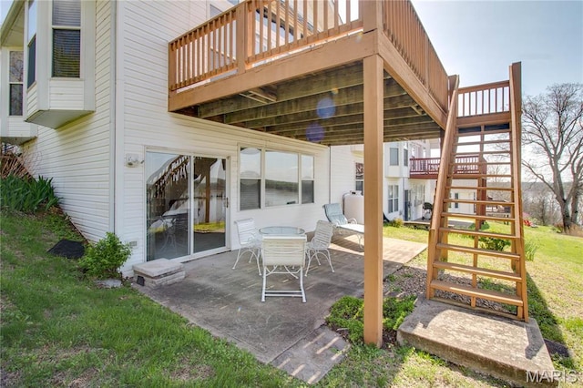 view of patio with stairway and a wooden deck
