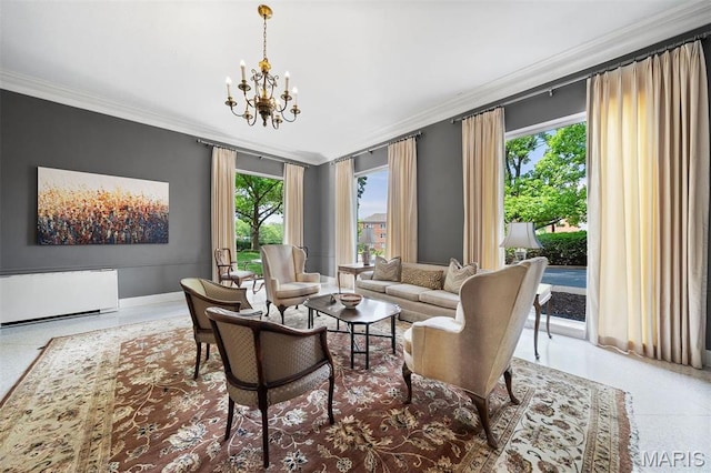 living room featuring ornamental molding, baseboards, healthy amount of natural light, and a chandelier