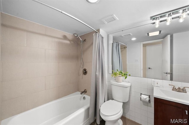 full bathroom with shower / bath combo with shower curtain, toilet, and vanity