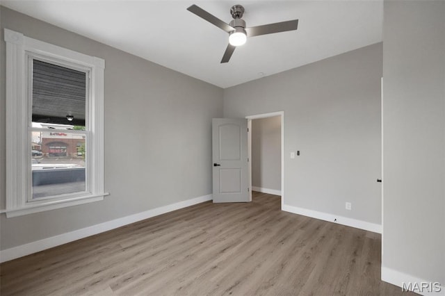 4311 Loughborough Ave, Saint Louis, MO 63116 - unfurnished room featuring wood finished floors and a ceiling fan