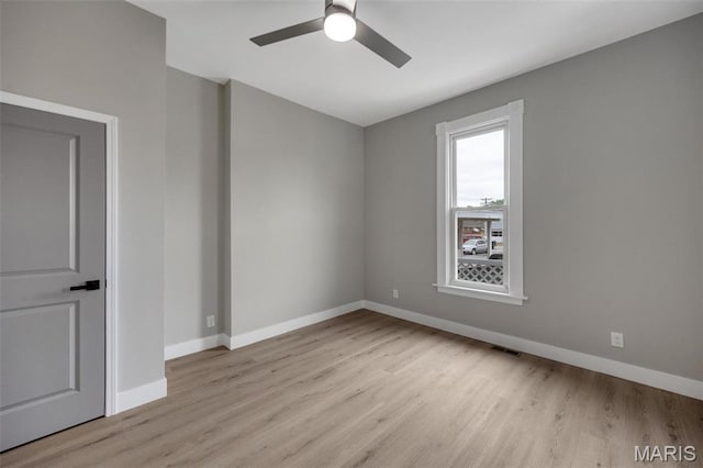 4311 Loughborough Ave, Saint Louis, MO 63116 - spare room with wood finished floors and ceiling fan