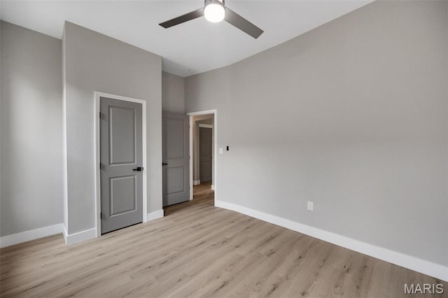4311 Loughborough Ave, Saint Louis, MO 63116 - unfurnished bedroom featuring light wood-style flooring and ceiling fan