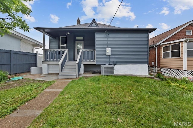 4311 Loughborough Ave, Saint Louis, MO 63116 - back of property with a chimney and covered porch