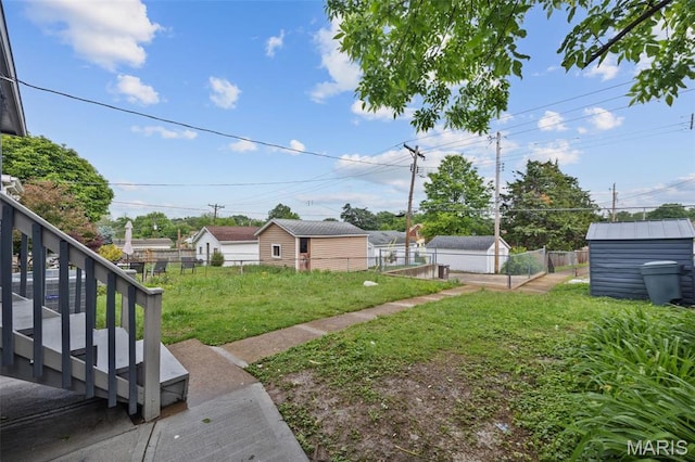 4311 Loughborough Ave, Saint Louis, MO 63116 - view of yard featuring a garden and a shed