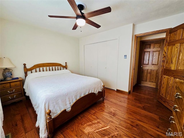 bedroom featuring wood finished floors, a closet, and ceiling fan