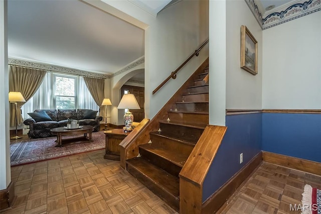 631 N Geyer Rd, Saint Louis, MO 63122 - staircase with arched walkways and baseboards