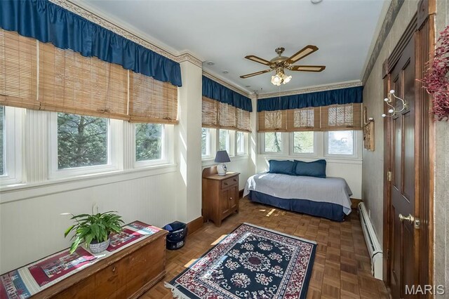 631 N Geyer Rd, Saint Louis, MO 63122 - bedroom featuring baseboard heating, baseboards, and crown molding
