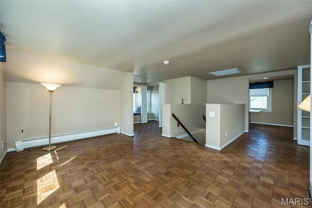 631 N Geyer Rd, Saint Louis, MO 63122 - additional living space featuring baseboards and a baseboard radiator