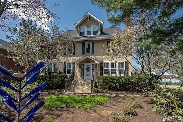 631 N Geyer Rd, Saint Louis, MO 63122 - view of front of property with stucco siding and a shingled roof