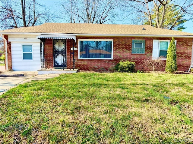7008 Rohn Dr, Saint Louis, MO 63121 - ranch-style home featuring brick siding and a front lawn