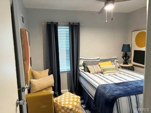7008 Rohn Dr, Saint Louis, MO 63121 - bedroom with ceiling fan