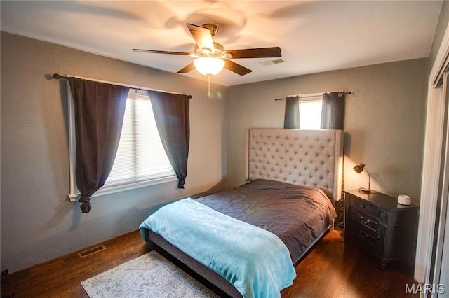 bedroom with wood finished floors and ceiling fan