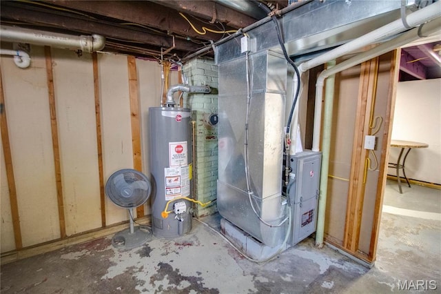 utility room with gas water heater and heating unit