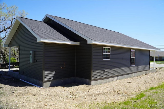 791 Main St, Lebanon, MO 65536 - view of property exterior featuring a shingled roof