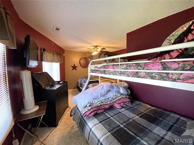 1920 Choctaw Path, Hermann, MO 65041 - carpeted bedroom with ceiling fan and a textured ceiling