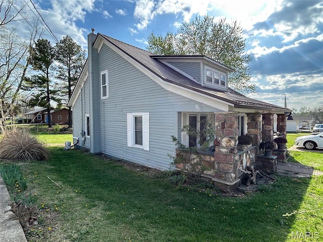 705 E Gibbs St, Salem, MO 65560 - view of property exterior with a yard and a chimney