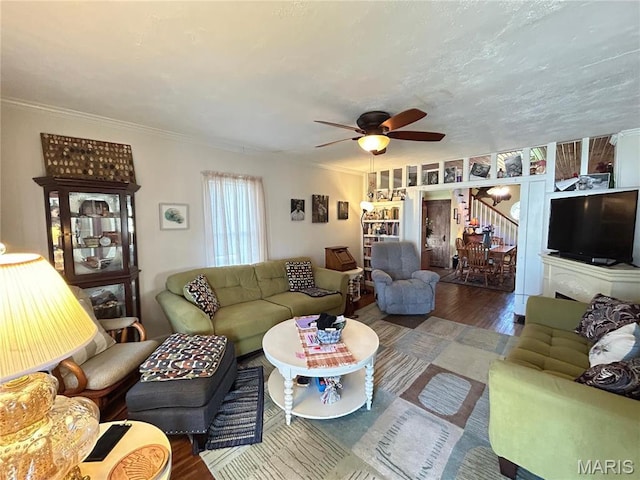 705 E Gibbs St, Salem, MO 65560 - living room featuring wood finished floors, ceiling fan, and ornamental molding